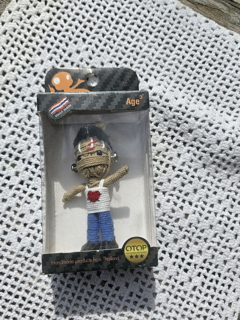 Handmade Little Frank string doll keychain from the Kamibashi "String Doll Gang"